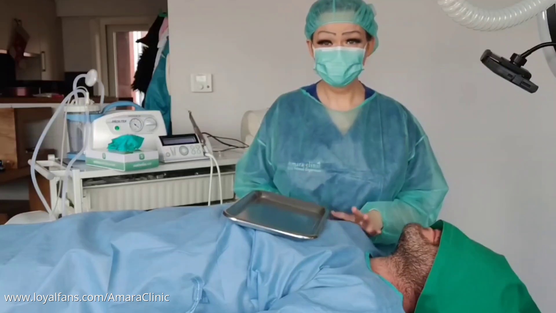 Dr Amara will examine the mouth of this patient with her beautiful gloved hands. First we will see how Dr Amara looks while doing her dental examination and then you get a close up look of her a - Katia van Looy dentist dental